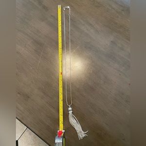 Long silver costume jewelry necklace